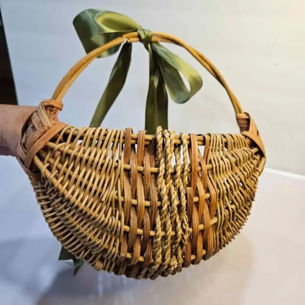 Wicker Basket with Green Ribbon, Broken Handle. Flat side. Wall decor